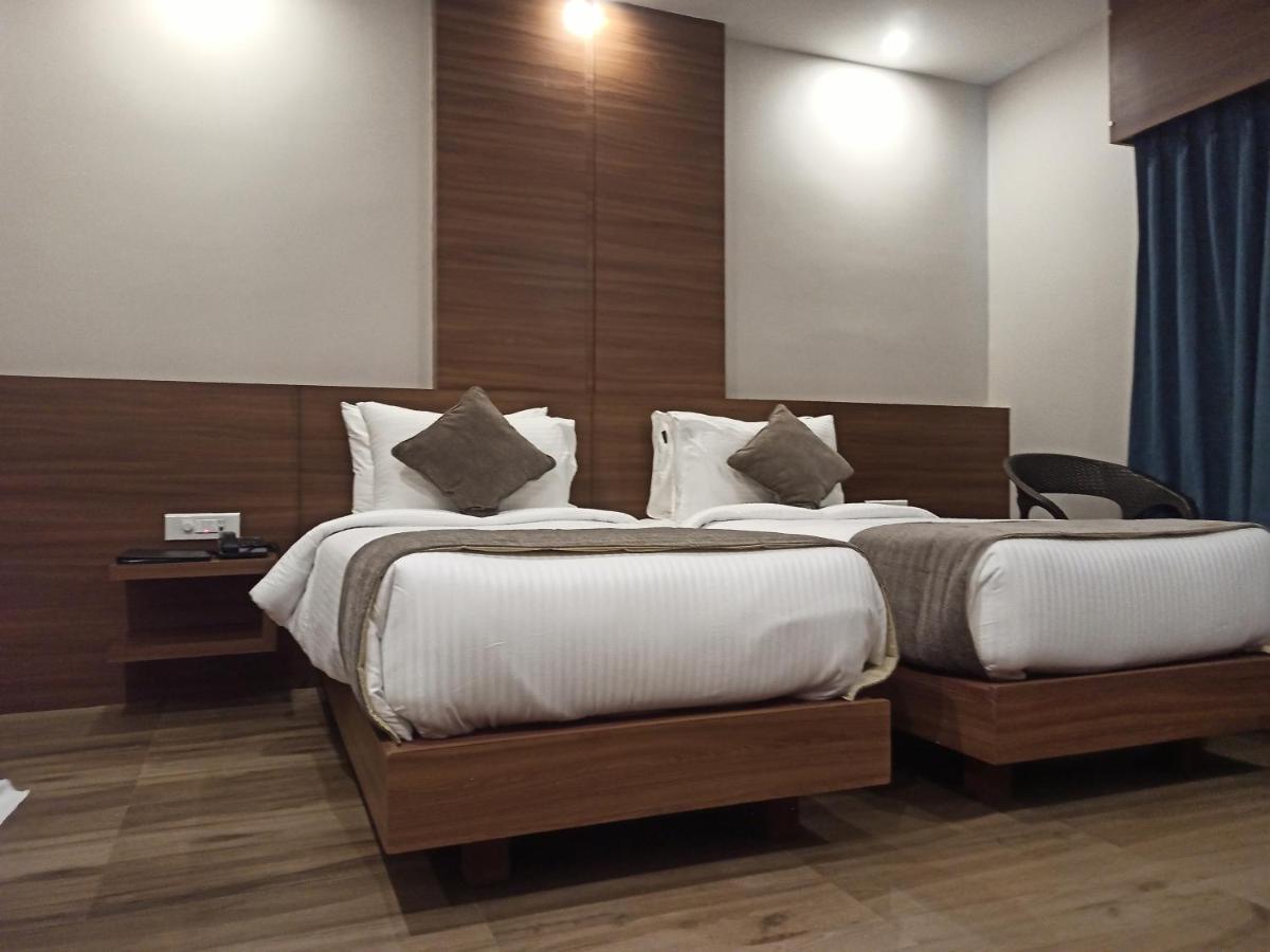 Hotel Tree Fern Dibrugarh Extérieur photo